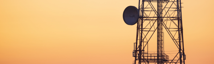 Silhouette of communication tower for broadcasting during sunrise time.