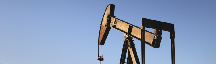 Close up picture of old rusty pump jack in the oilfield in Texas, USA