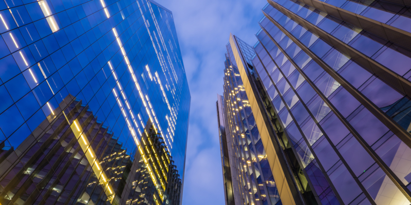 Looking up to the glass and steel skyscrapers in the heart of London’s Financial District.