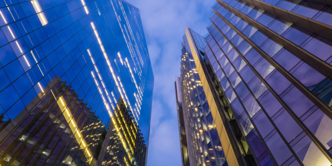 Looking up to the glass and steel skyscrapers in the heart of London’s Financial District.