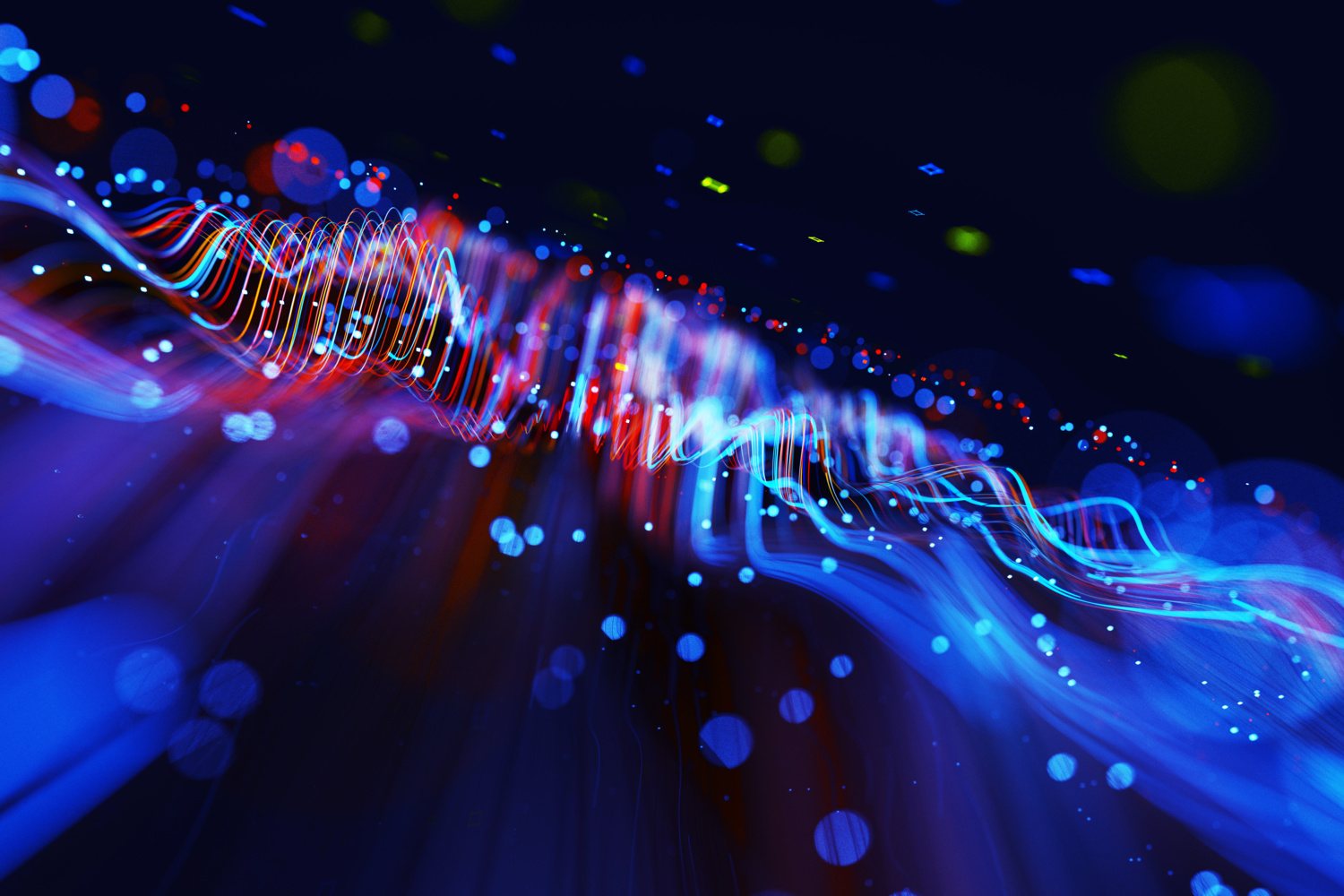 Digital generated image of abstract flowing data made out of glowing blue and red splines moving away from camera on black background.