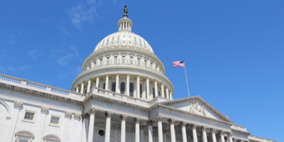 Washington DC, United States landmark. National Capitol building with US flag.